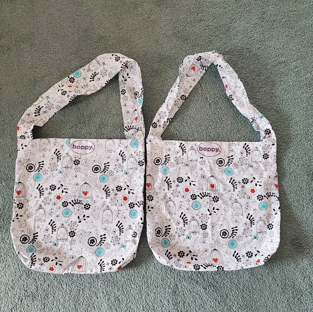 Two Boppy white floral tote bags